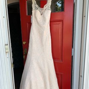 Brand new Augusta Jones bridal gown with tags.